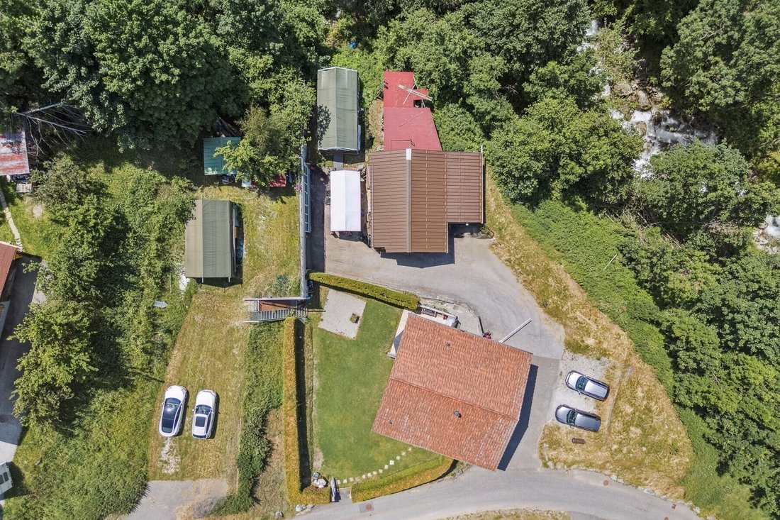 Large Property With Garage And Workshops